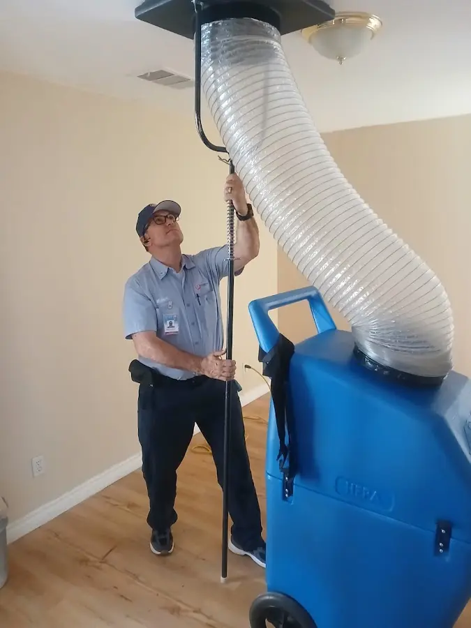 HVAC Installation technician using HEPA equipment in Whitney